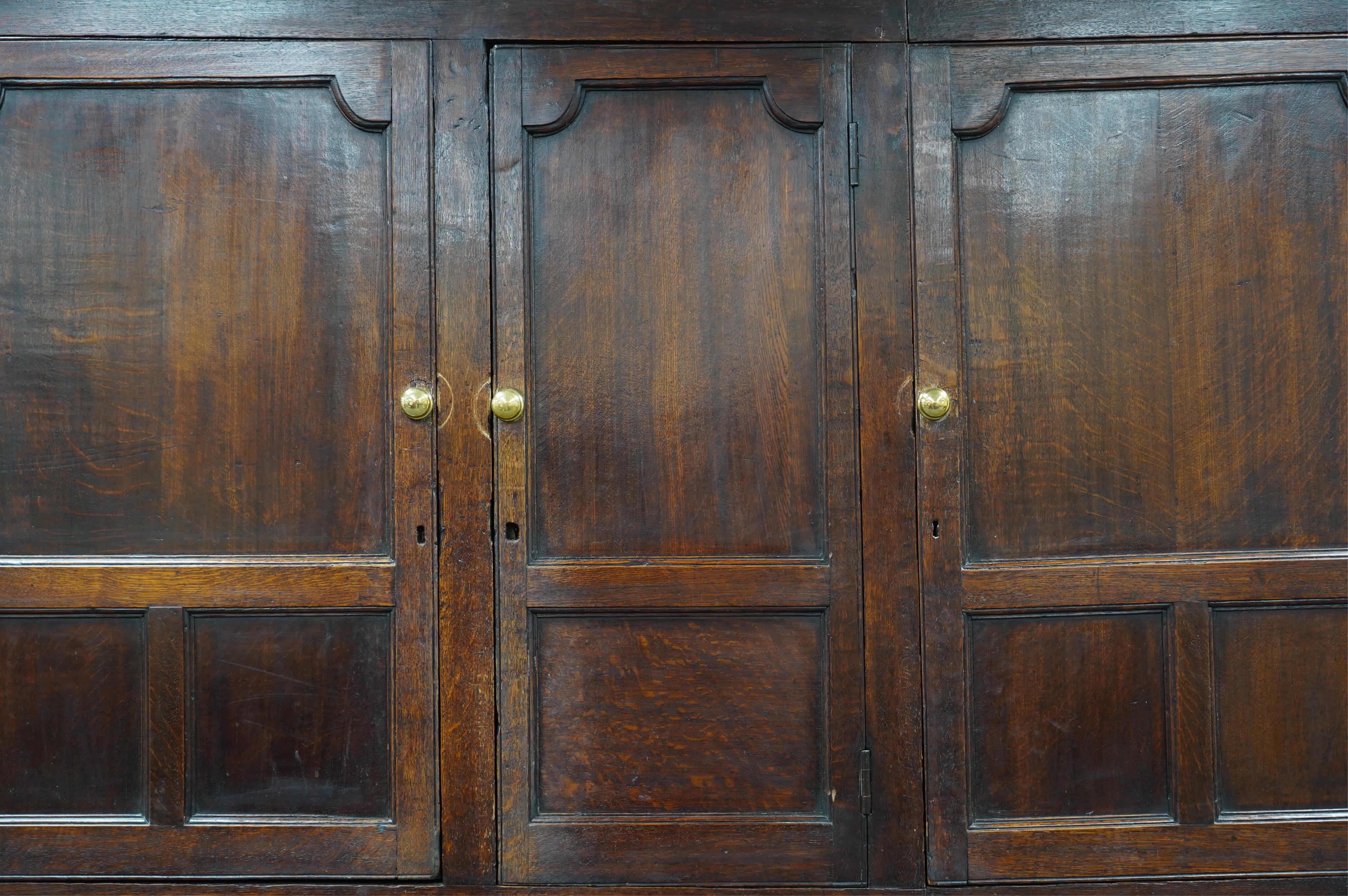 A mid 18th century oak press cupboard